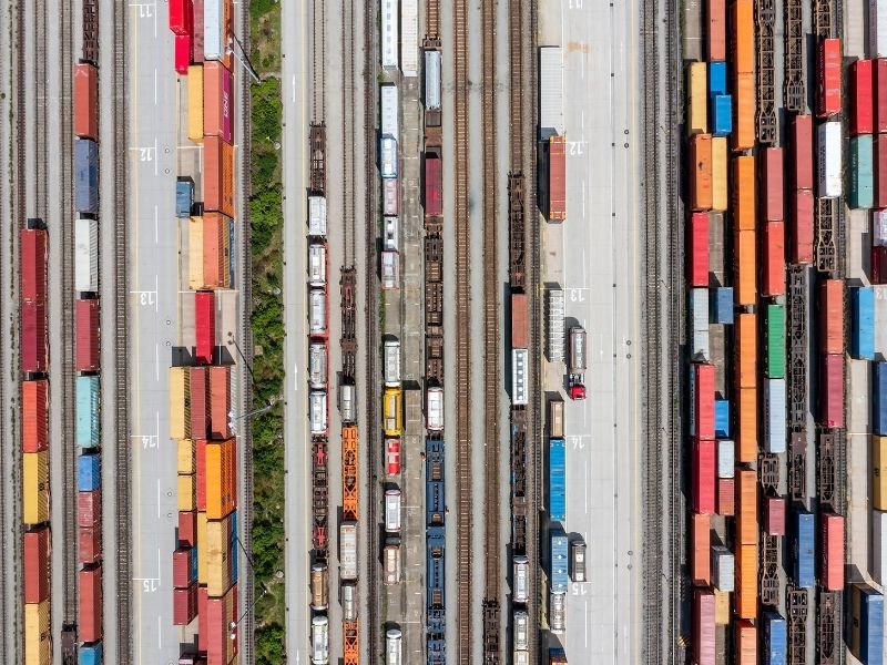 Aerial of an intermodal rail yard with containers